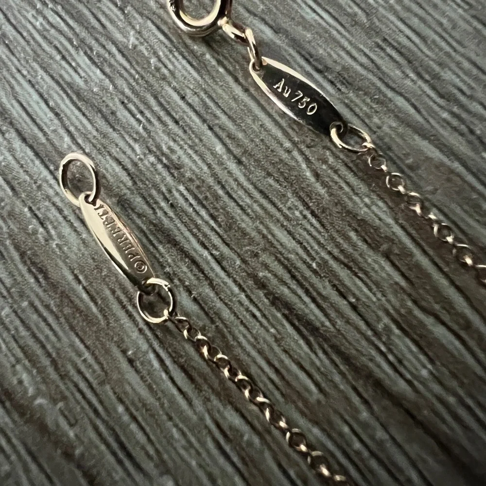 Tiffany & Co. Gold Heart Necklace with Silver Accents - Picture 9 of 10